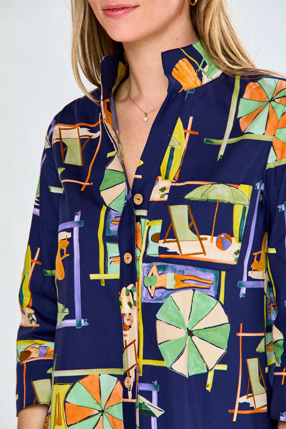 Woman in navy printed blouse