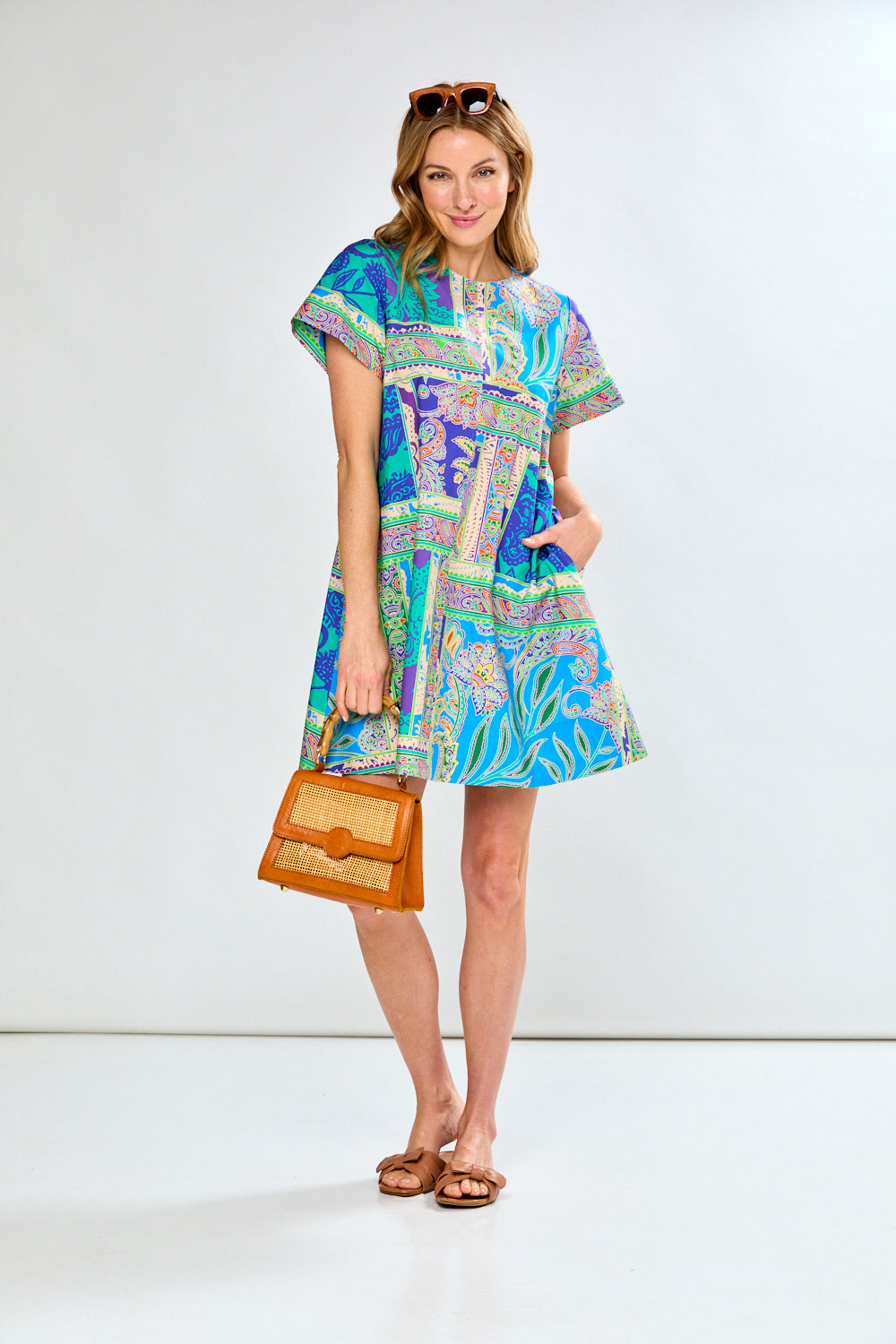 Woman in paisley print dress