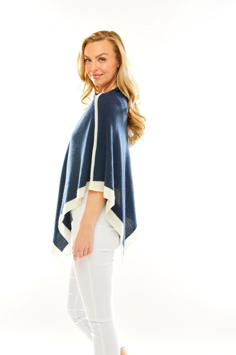 Woman in navy poncho