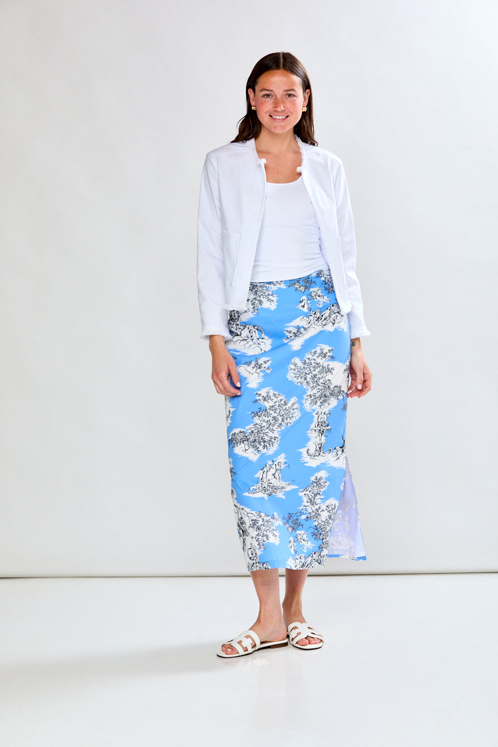 Woman in periwinkle toile midi skirt