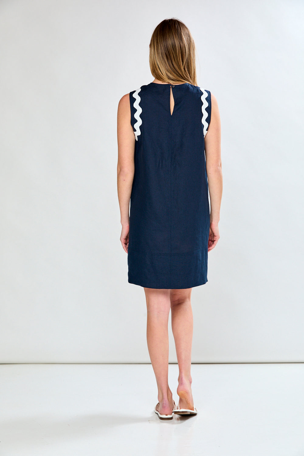 Woman in ric rac detail dress