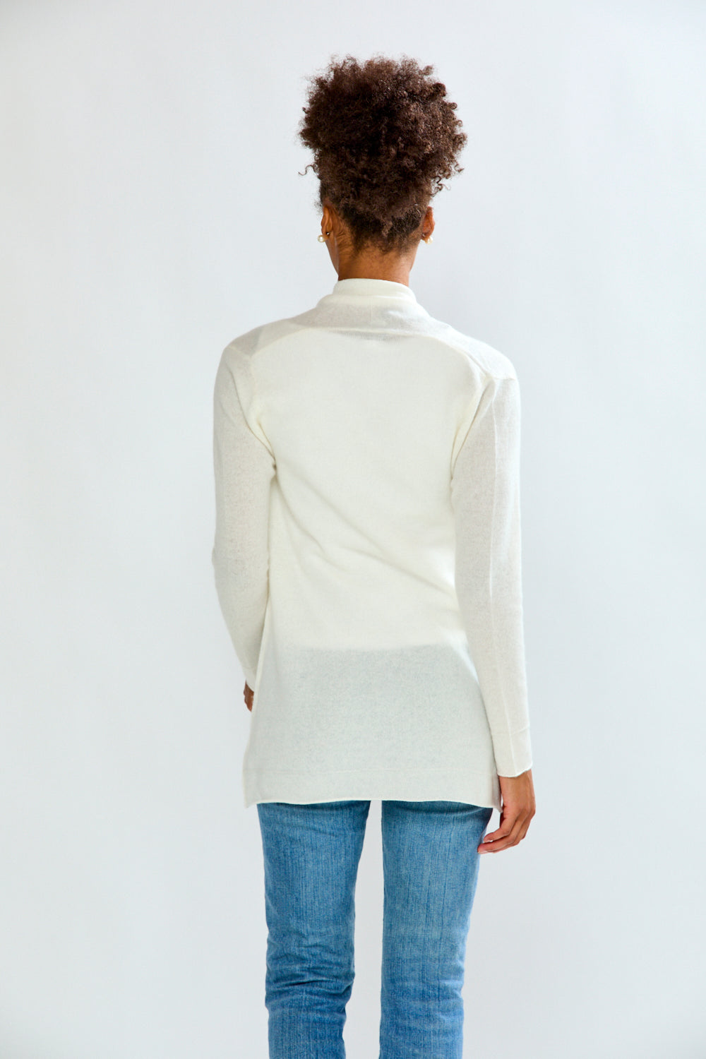 woman in white sweater