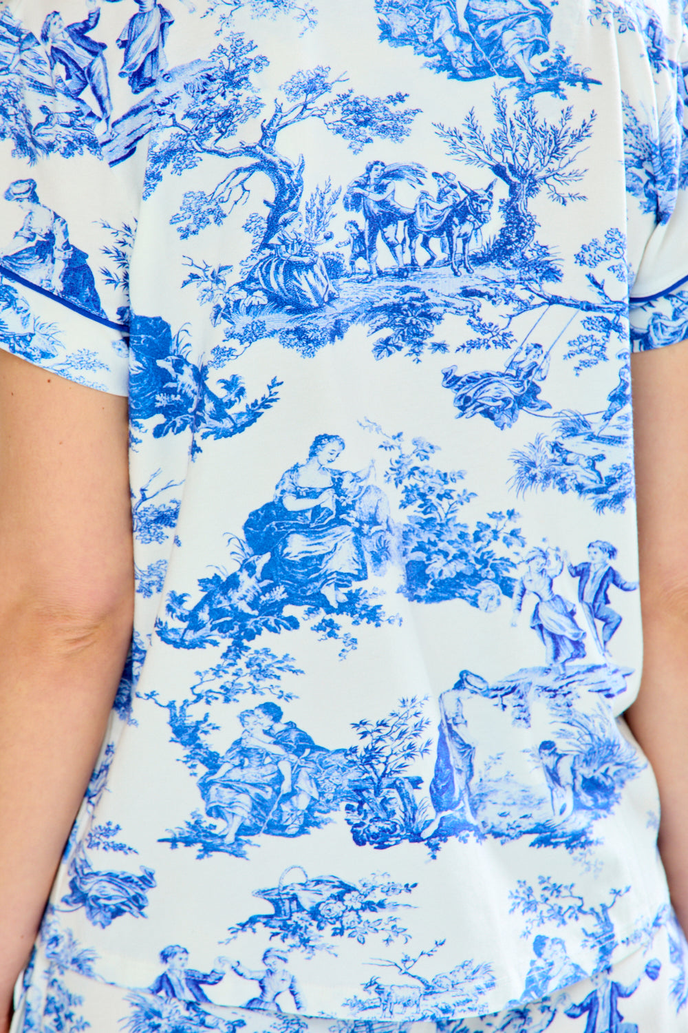 Woman in blue toile pajamas