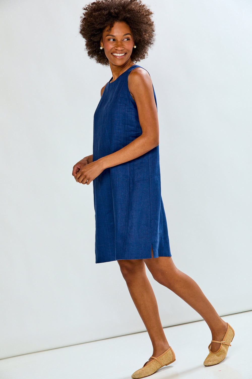 Woman in navy linen dress