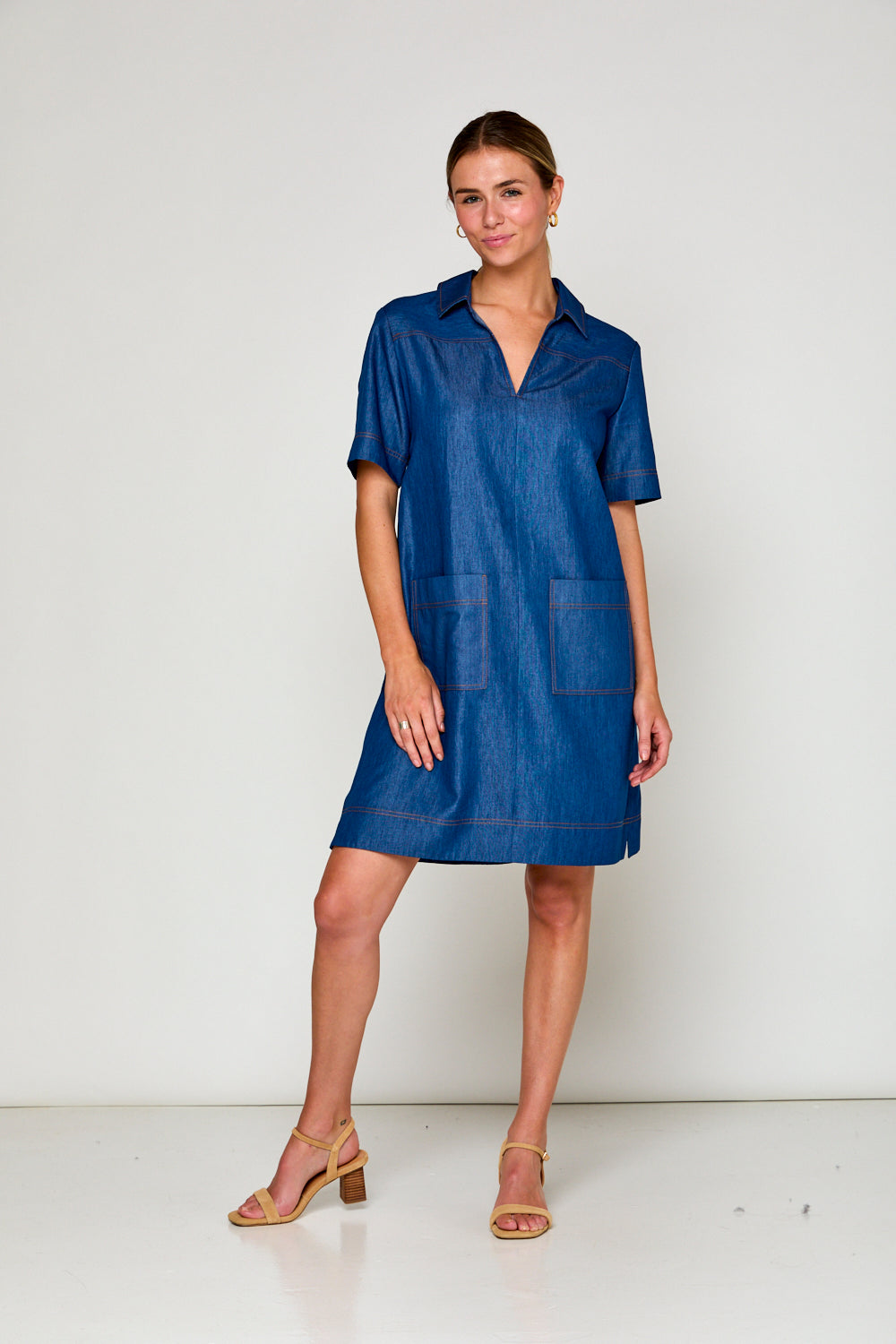 Woman in denim tencel dress