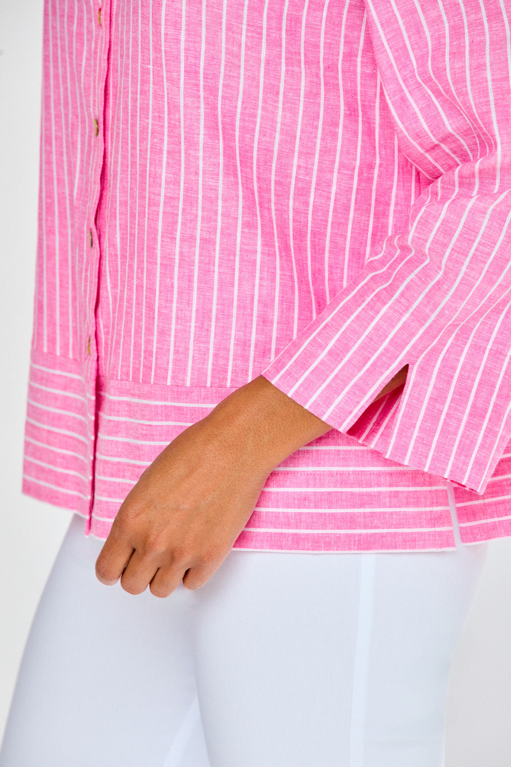 Woman in pink striped tunic