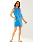 Woman in space blue linen dress