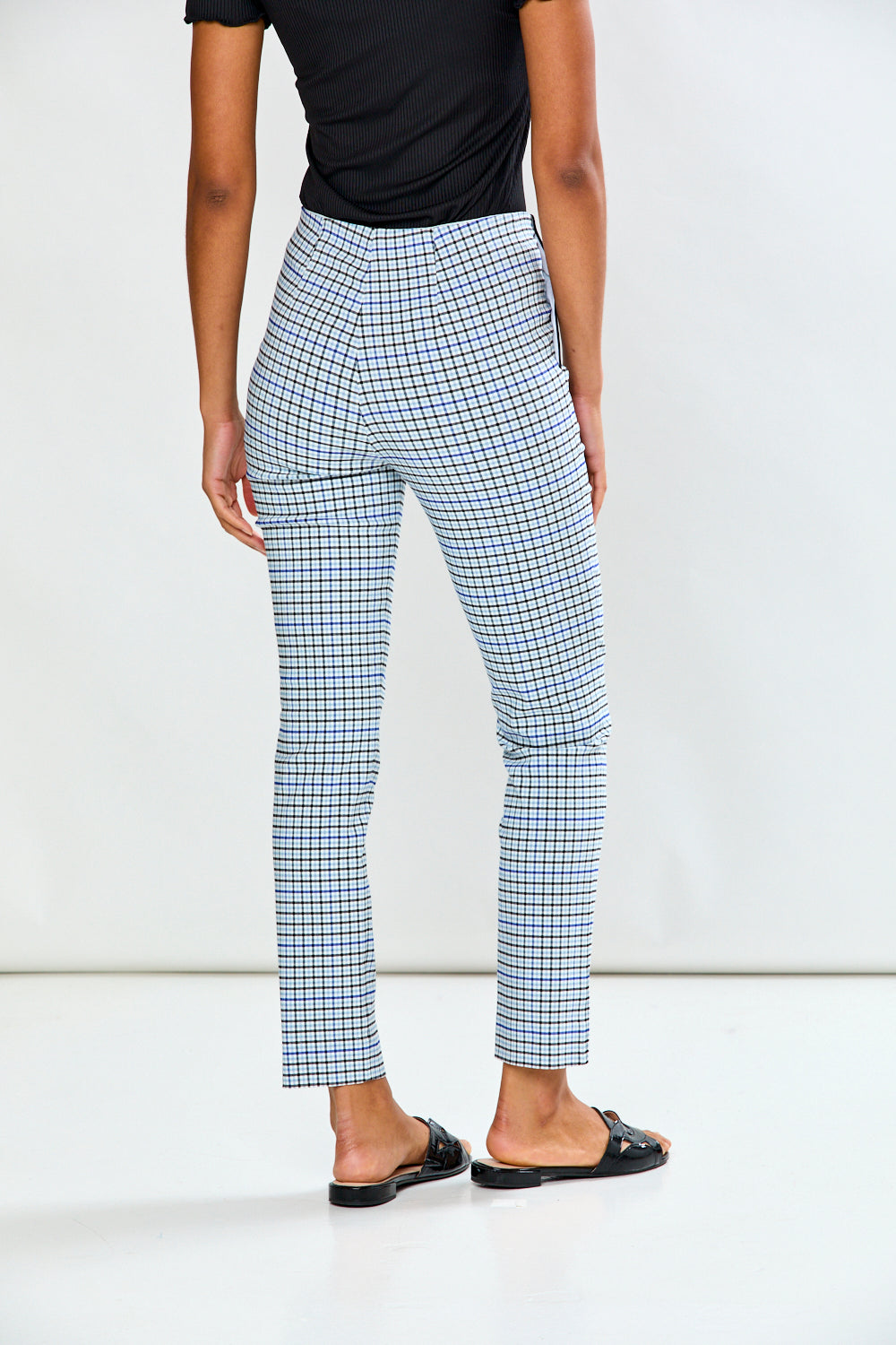 Woman in plaid pant