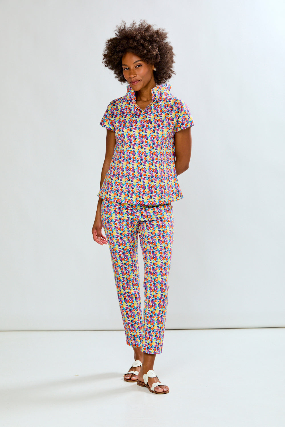 woman in floral pants