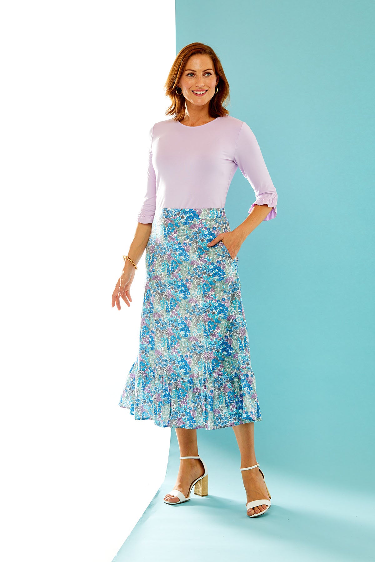 Woman in floral printed skirt