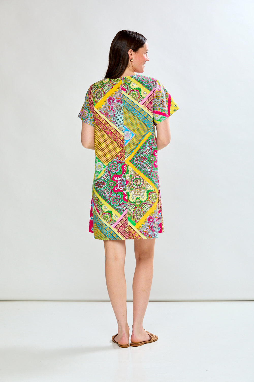 Woman wearing scarf print short dress