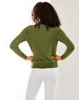 Woman in olive sweater