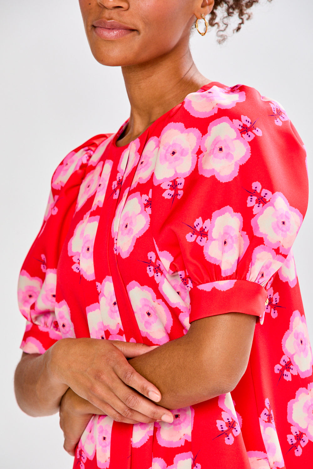 Girl in red dress with flowers