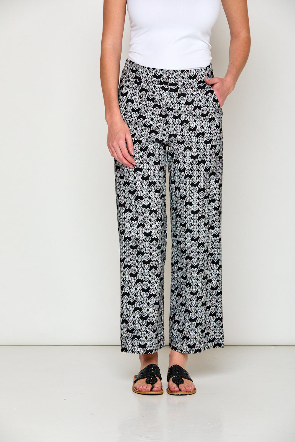 Woman in black and white print pants