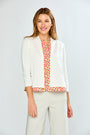 Woman wearing The Jackie Cardigan - White