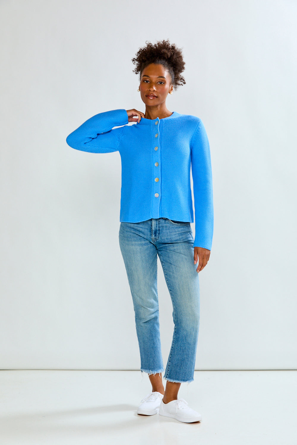 woman in periwinkle sweater