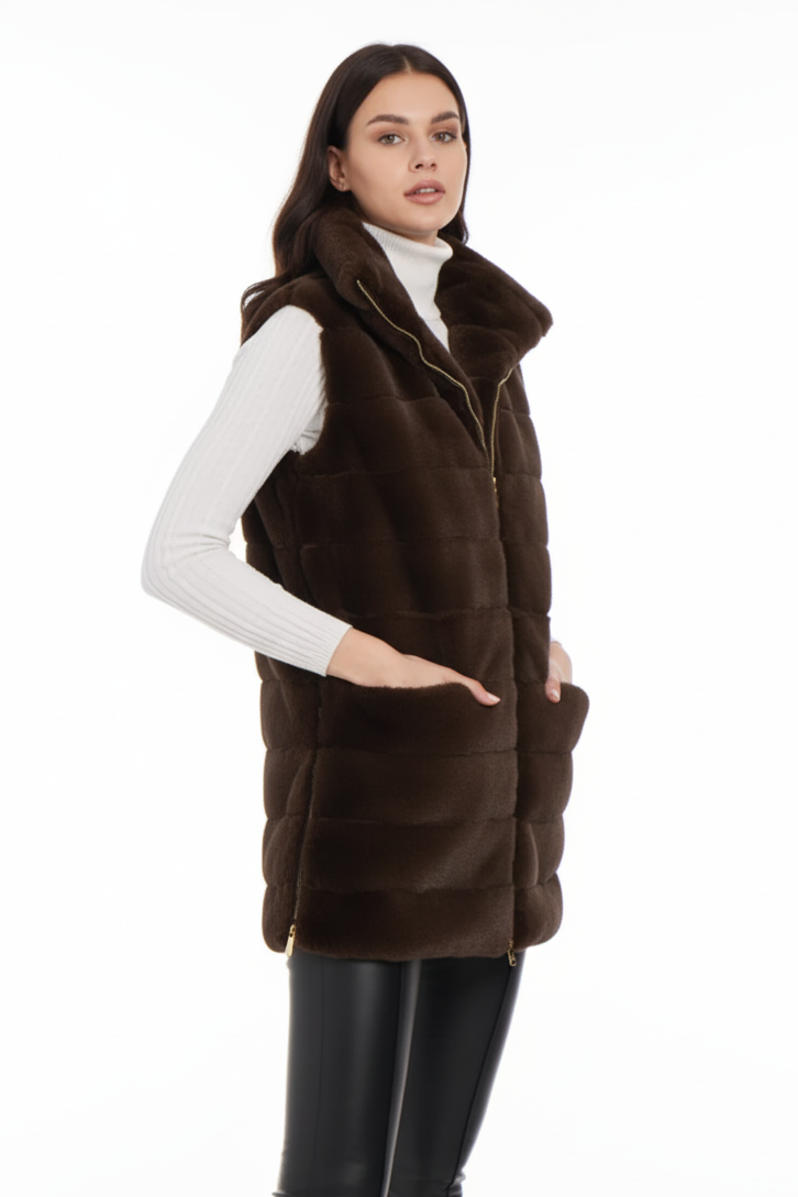 Woman wearing a chocolate brown faux fur vest