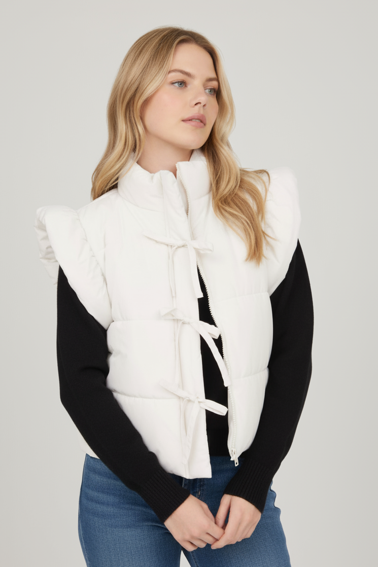 Woman wearing a cream vest