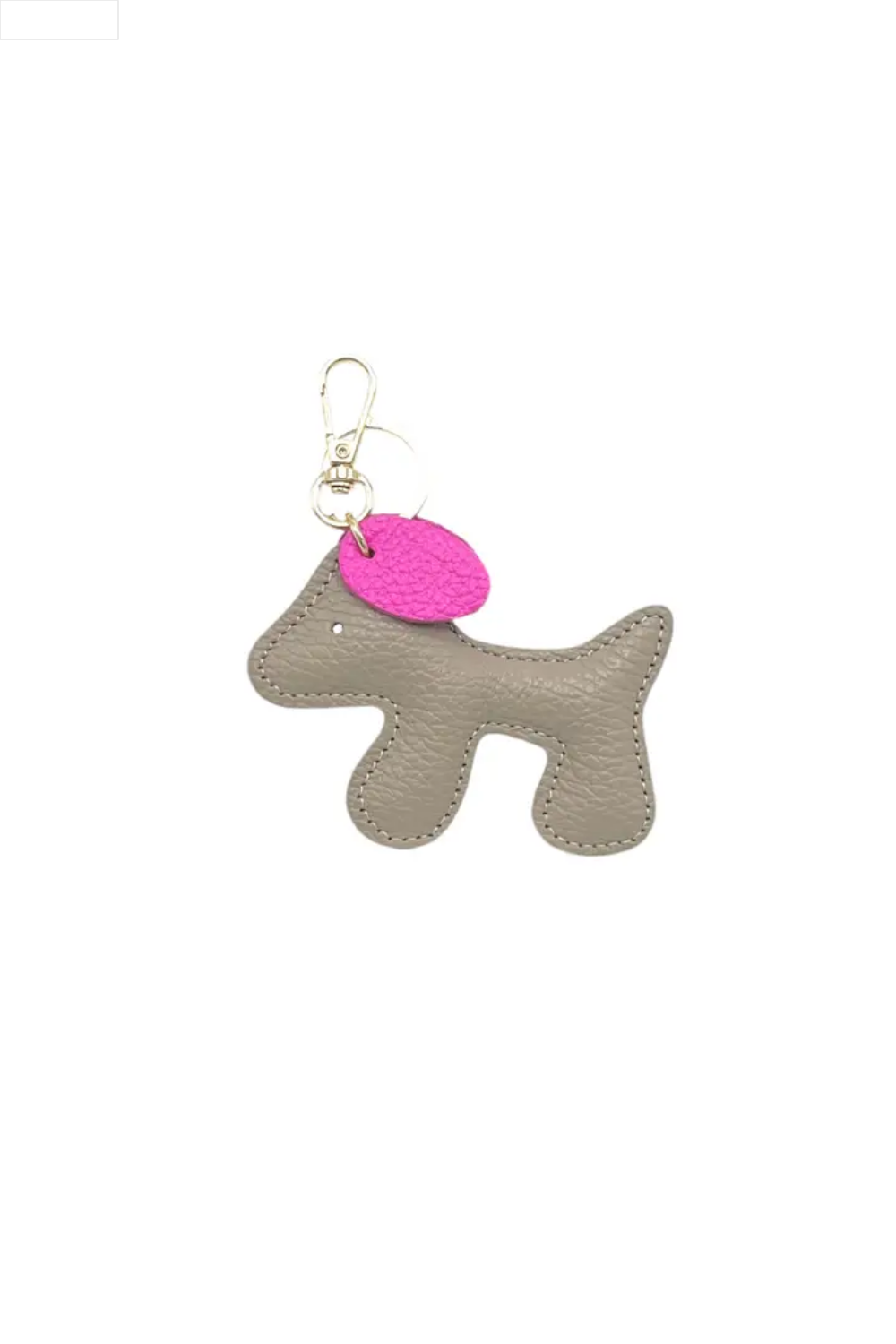 Dog-shaped keychain with a pink tag on a white background