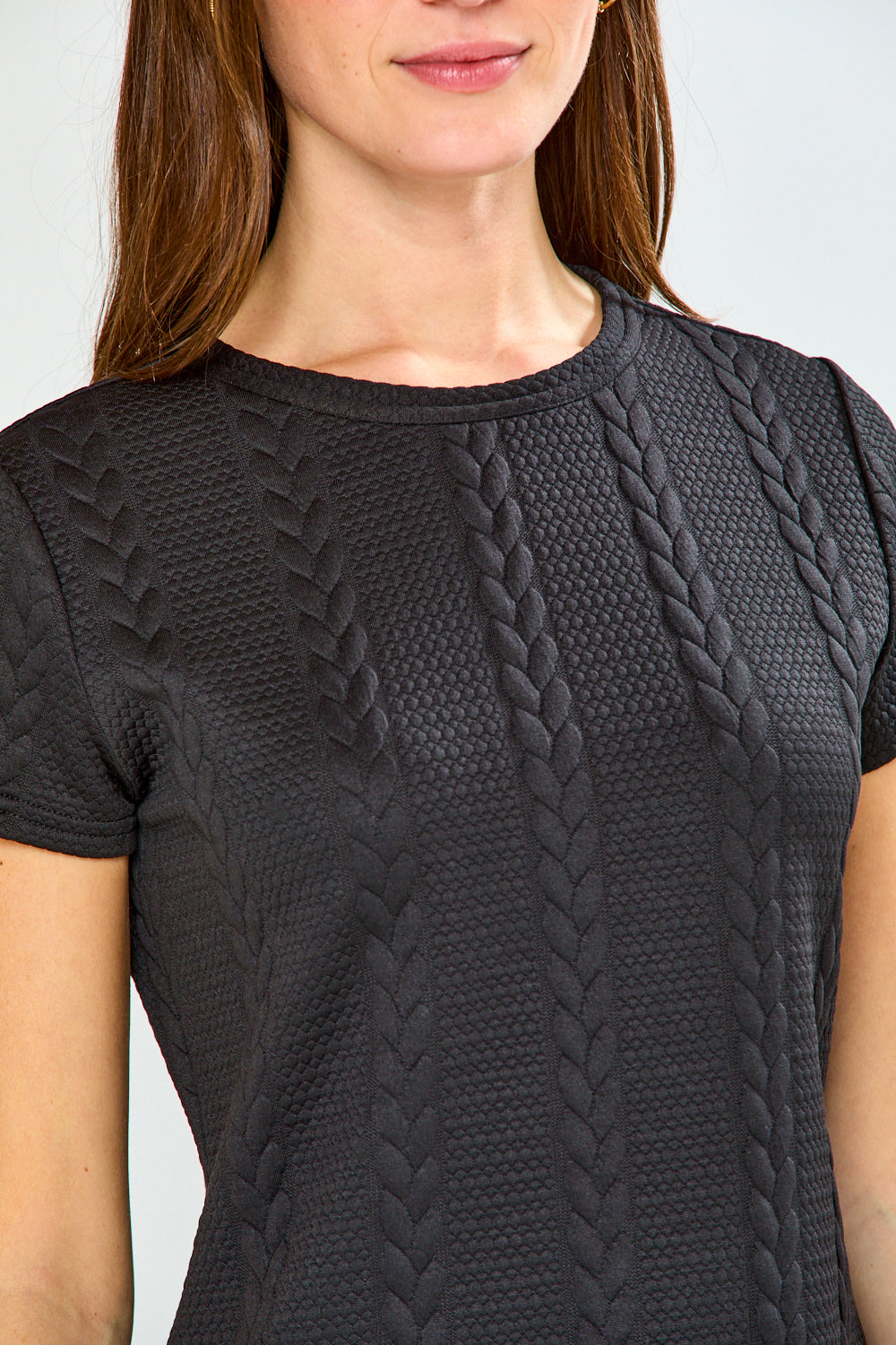 Woman wearing The Pamela Top in Cable