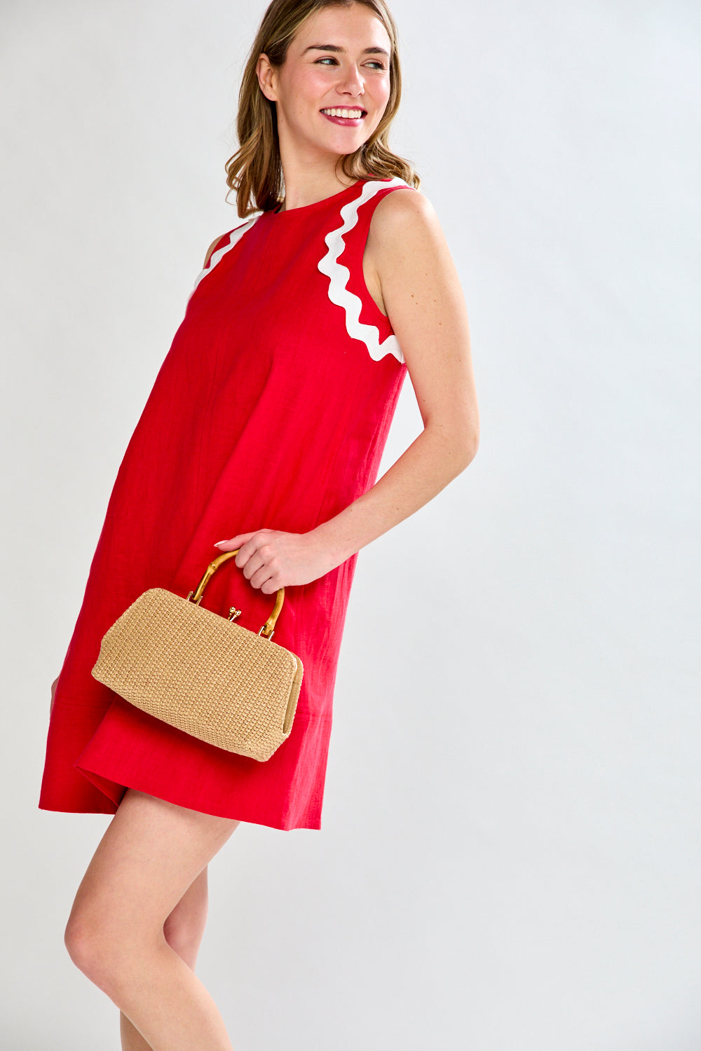 women in red dress with ric-rac