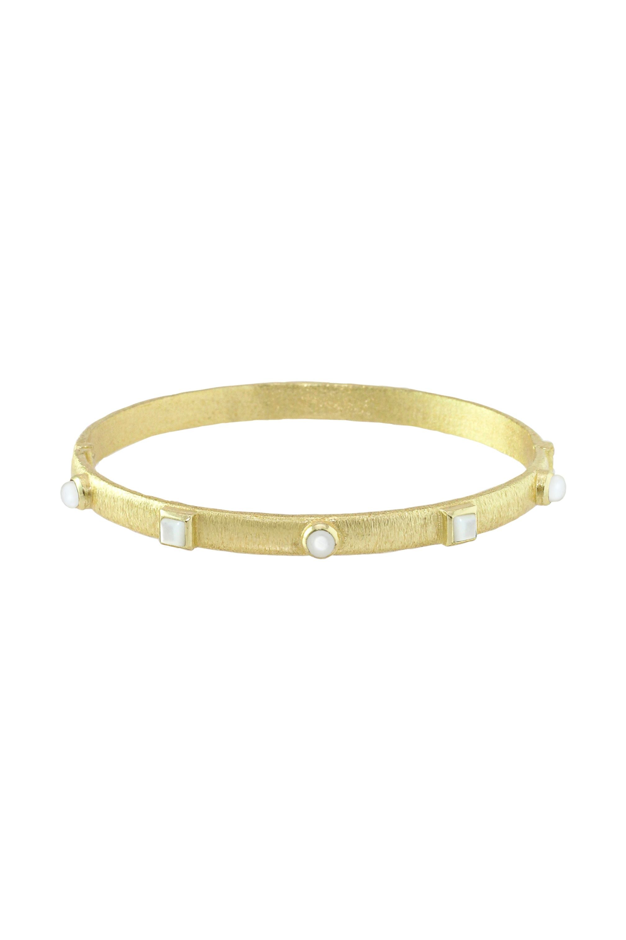 Gold bangle with pearl accents