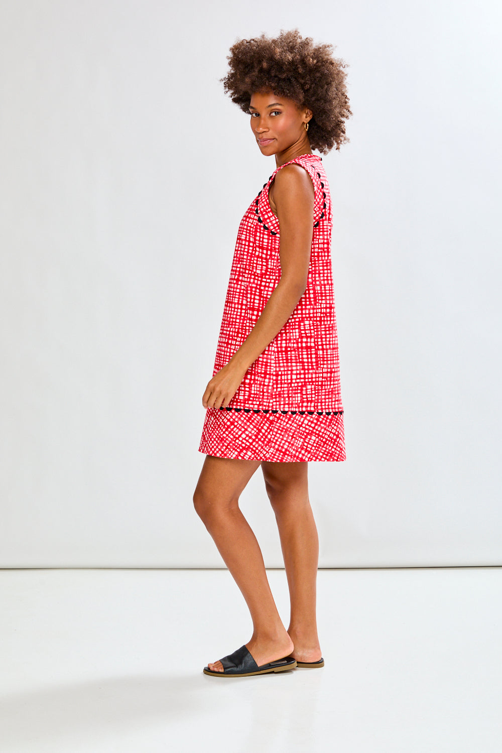 Woman in red patterned dress