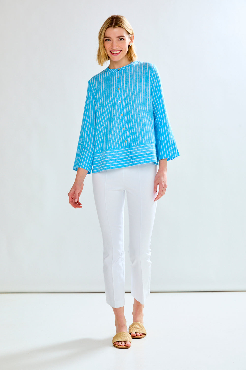 Woman in blue striped tunic