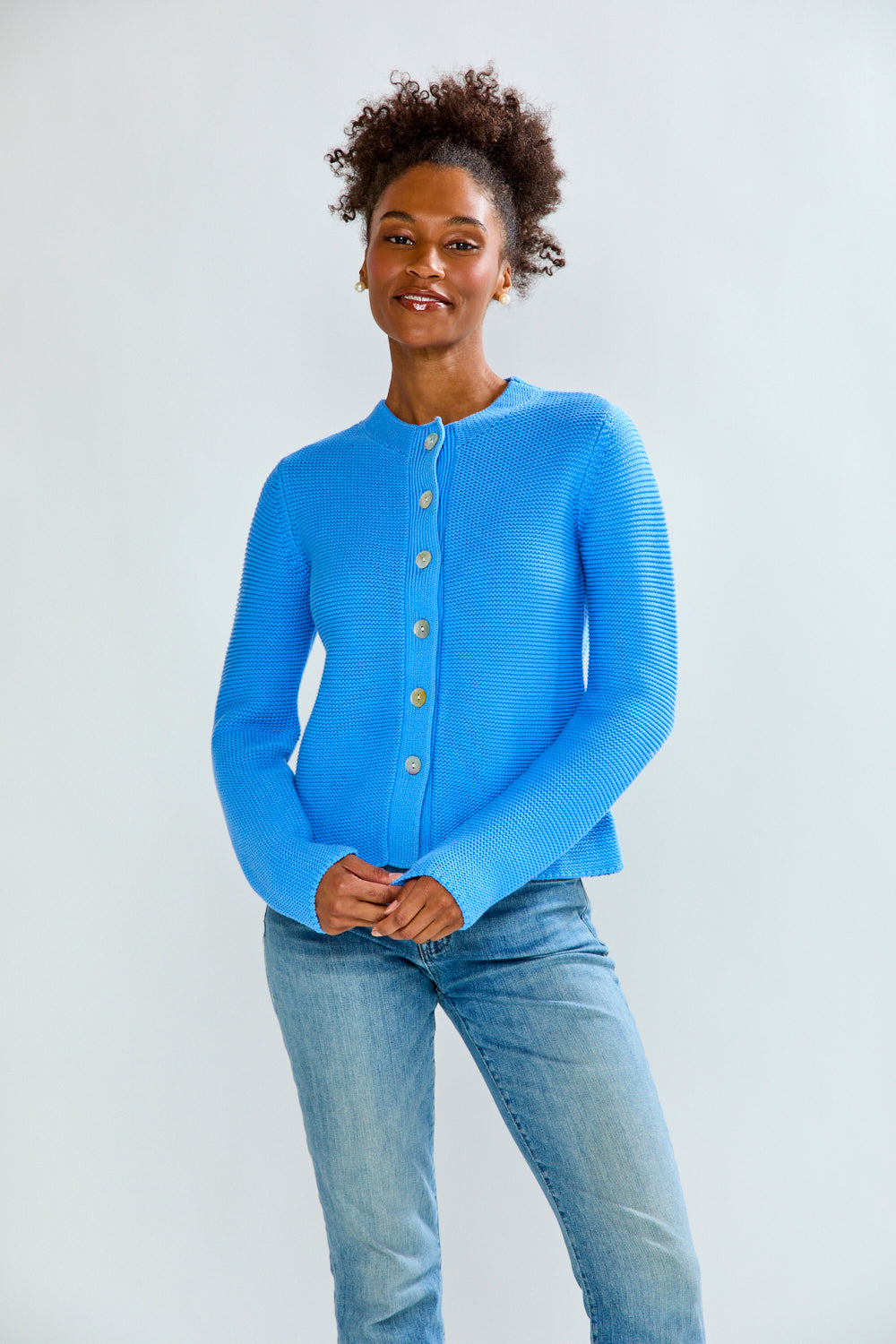 woman in periwinkle sweater