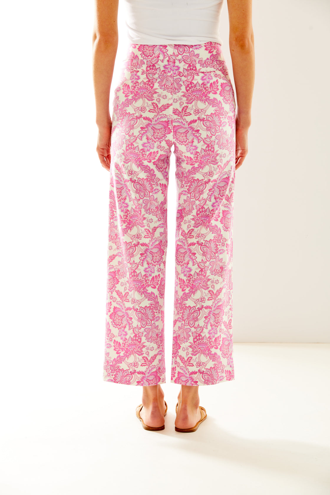 Woman in pink and white printed pant