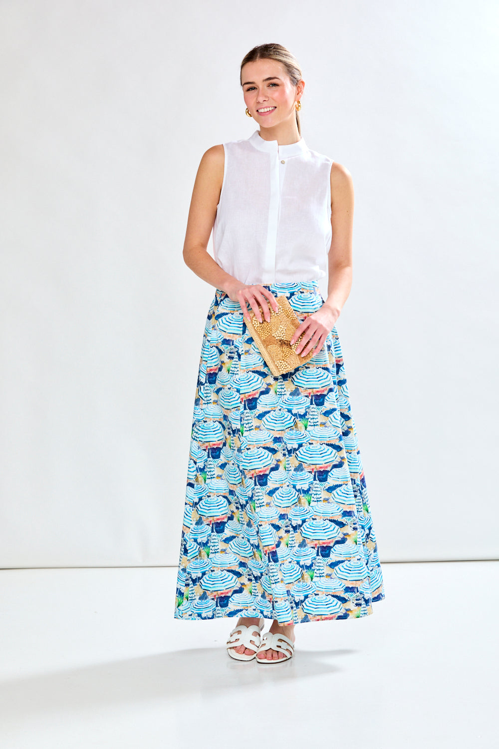 Woman in blue printed skirt