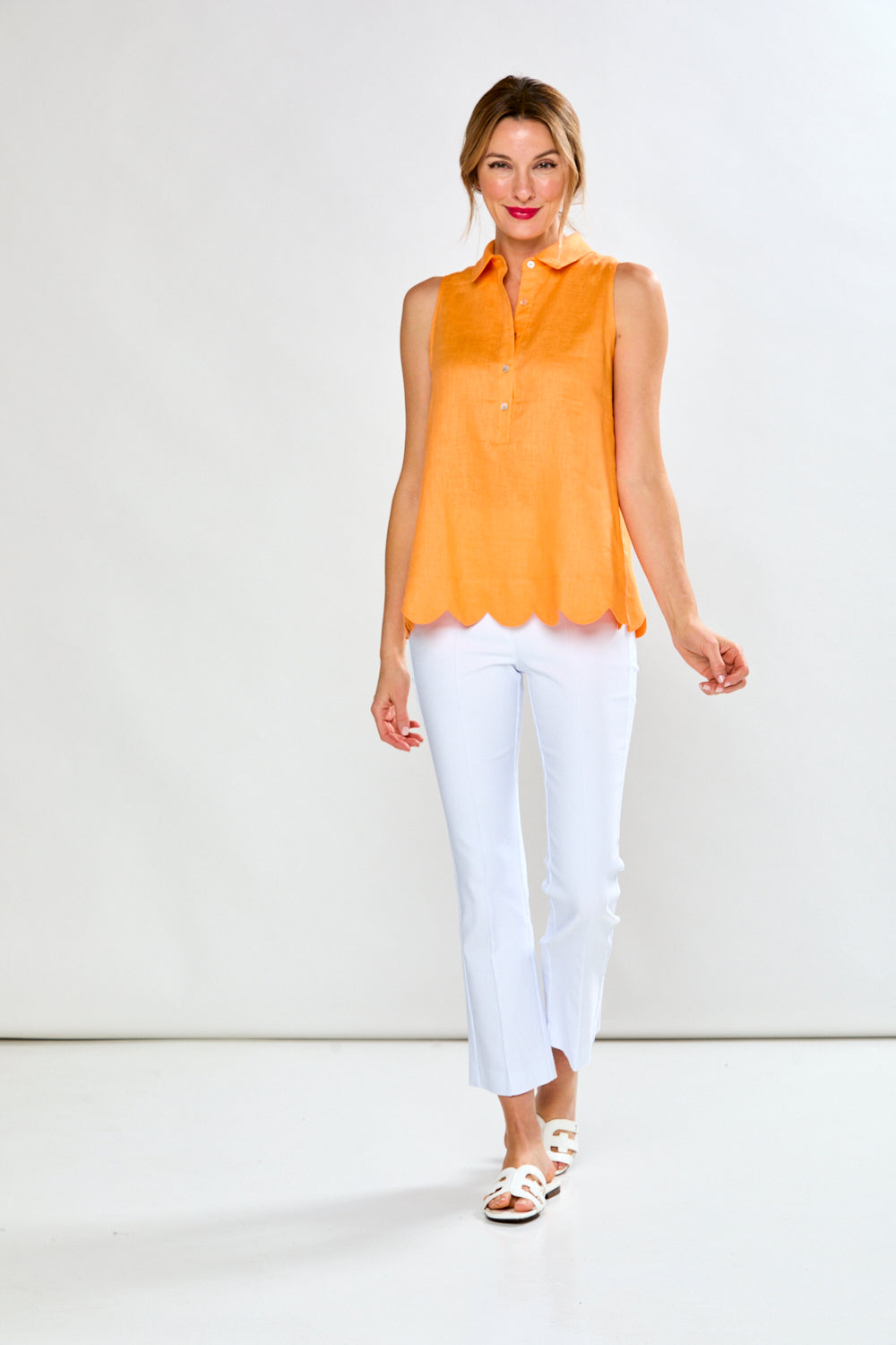 Woman in mandarin sleeveless blouse