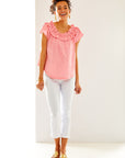 Woman in cotton candy ruffled top