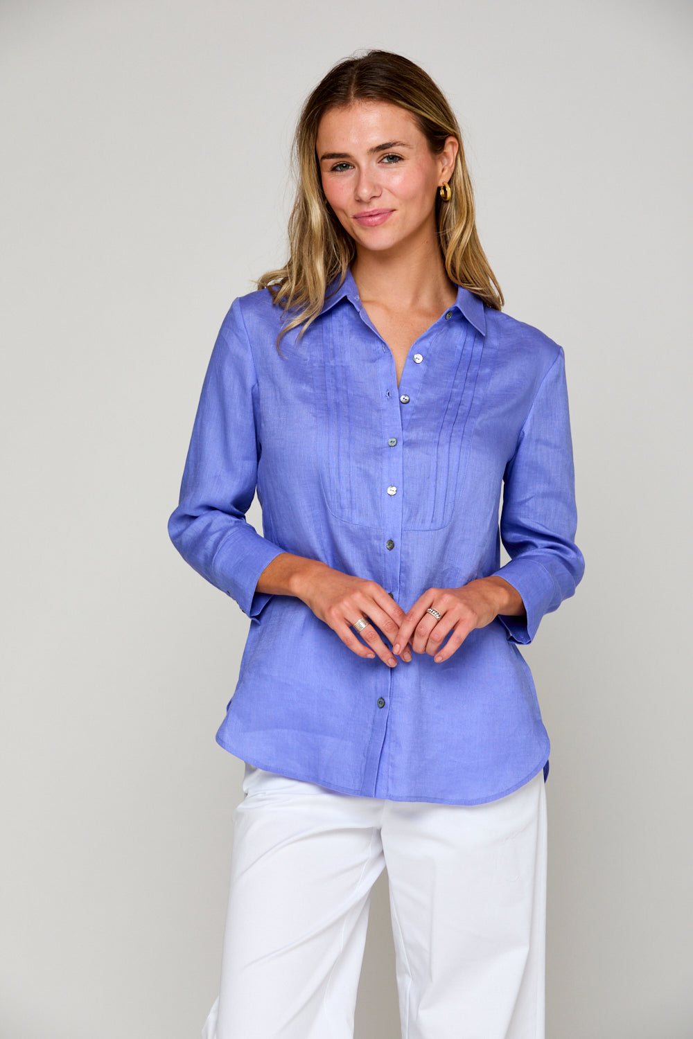 Woman in periwinkle blouse