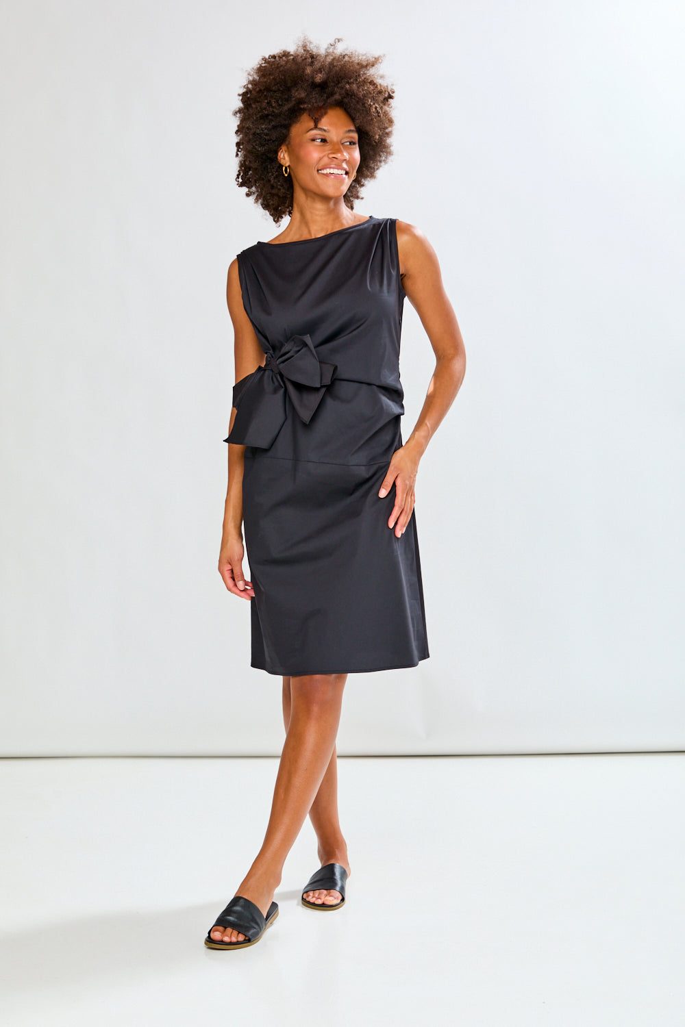 woman in a black dress