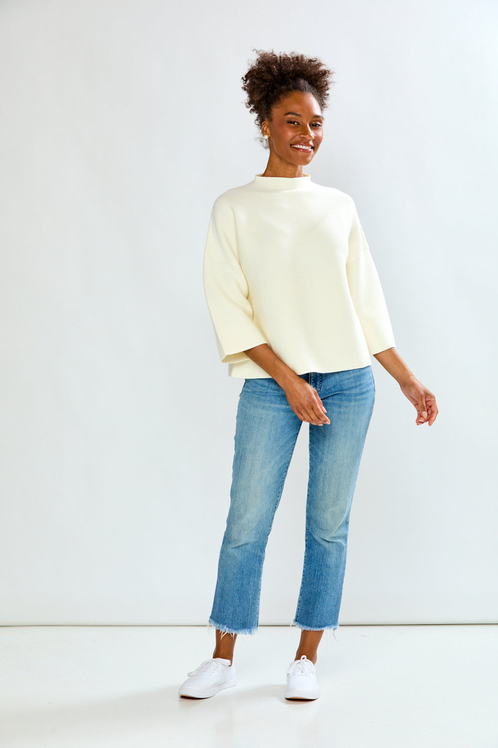 Girl is white sweater