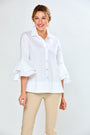 Woman in white blouse with flounce sleeve