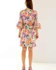 Woman in floral blossom dress