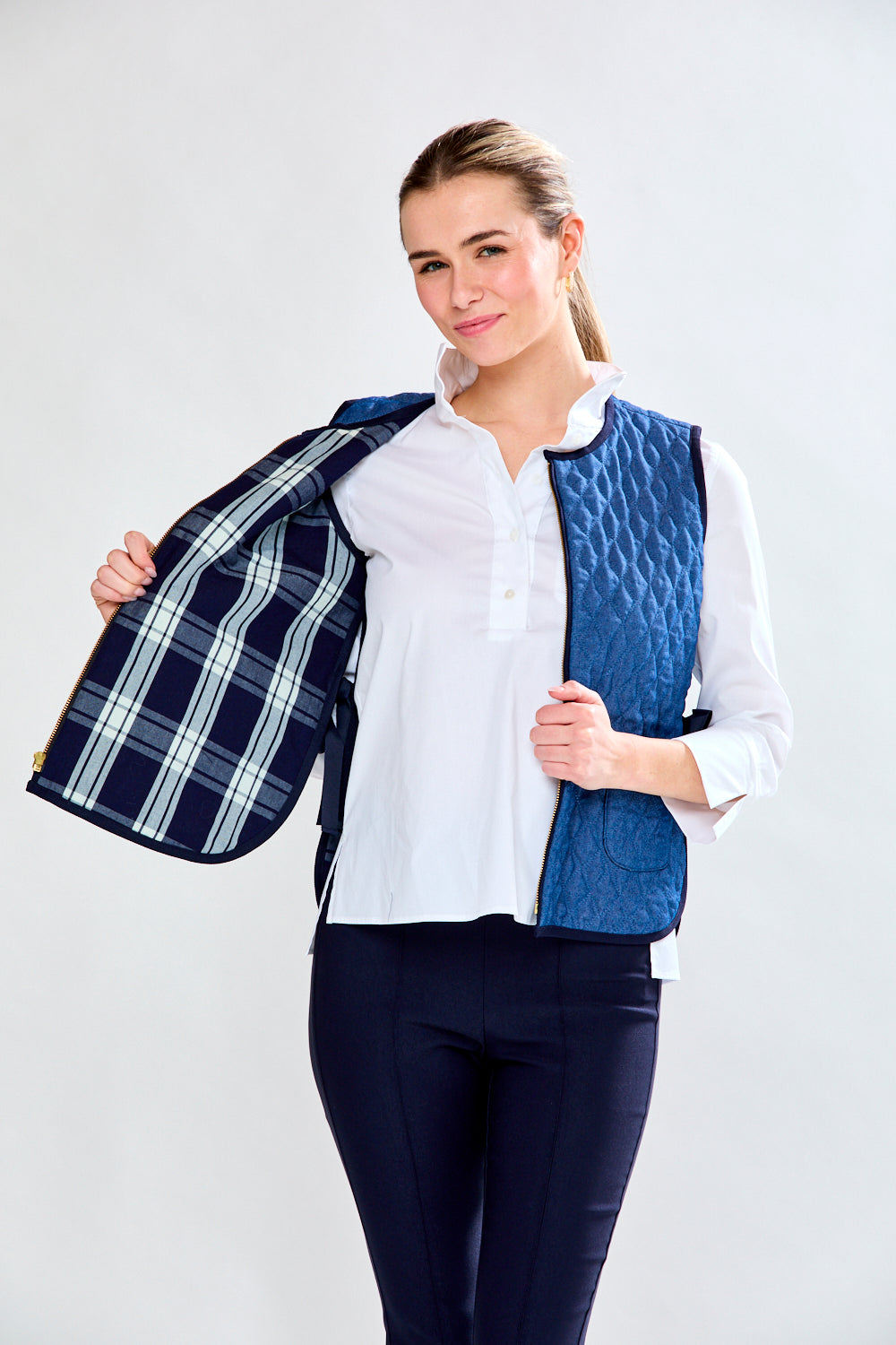 Woman in quilted vest