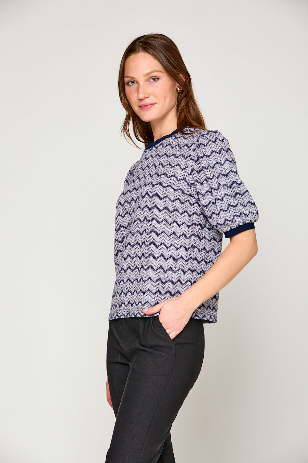 Woman in blue chevron top