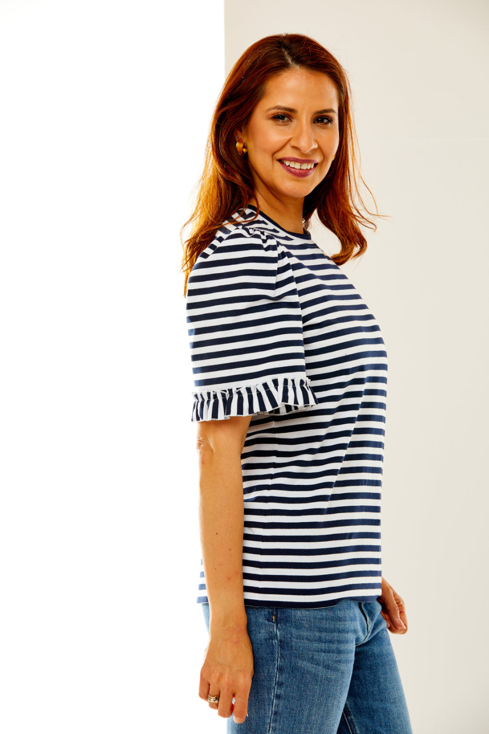 Woman in stripe knit top