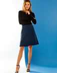 Woman in mini skirt with pockets