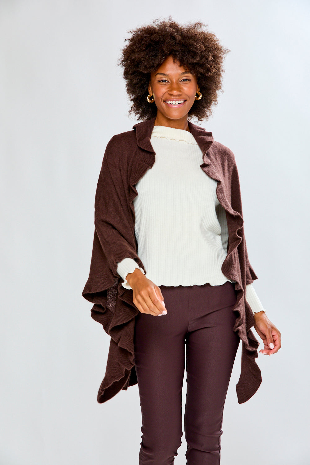 Woman wearing a espresso ruffle cashmere wrap