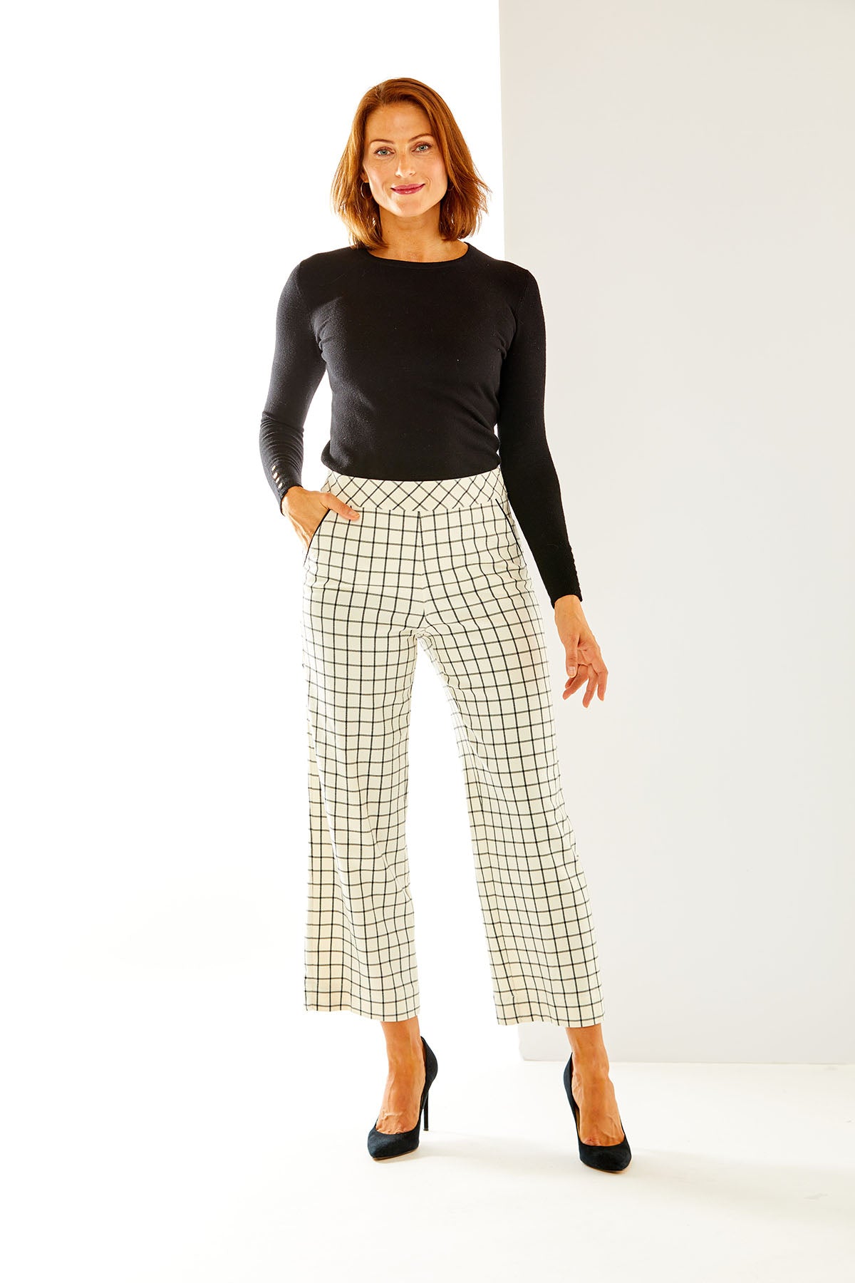 Woman in plaid pant