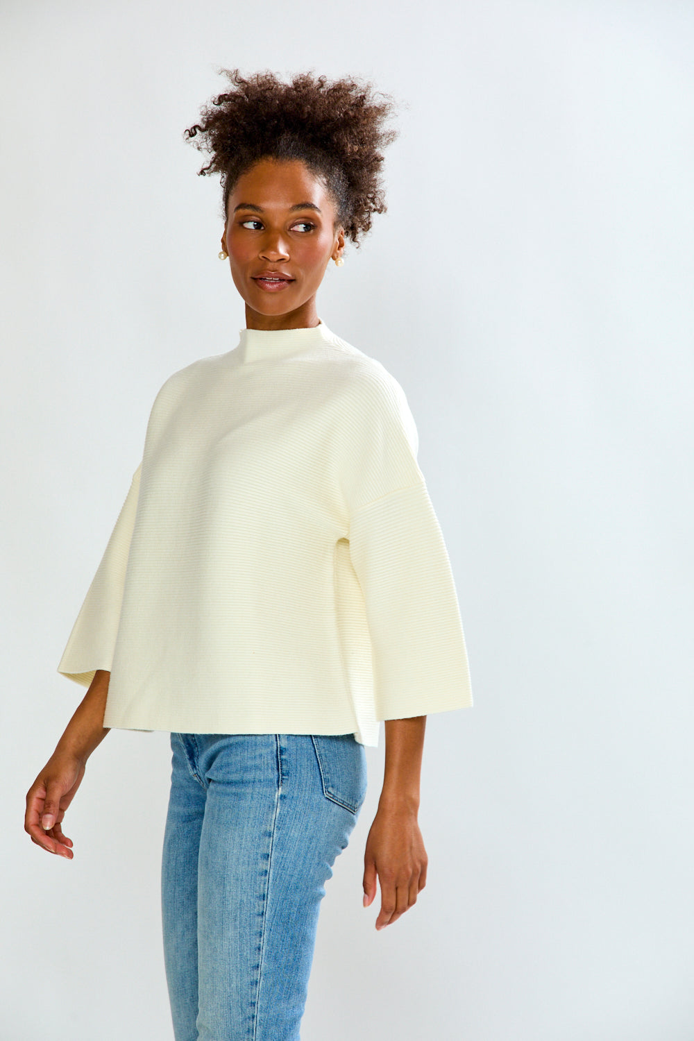 Girl is white sweater