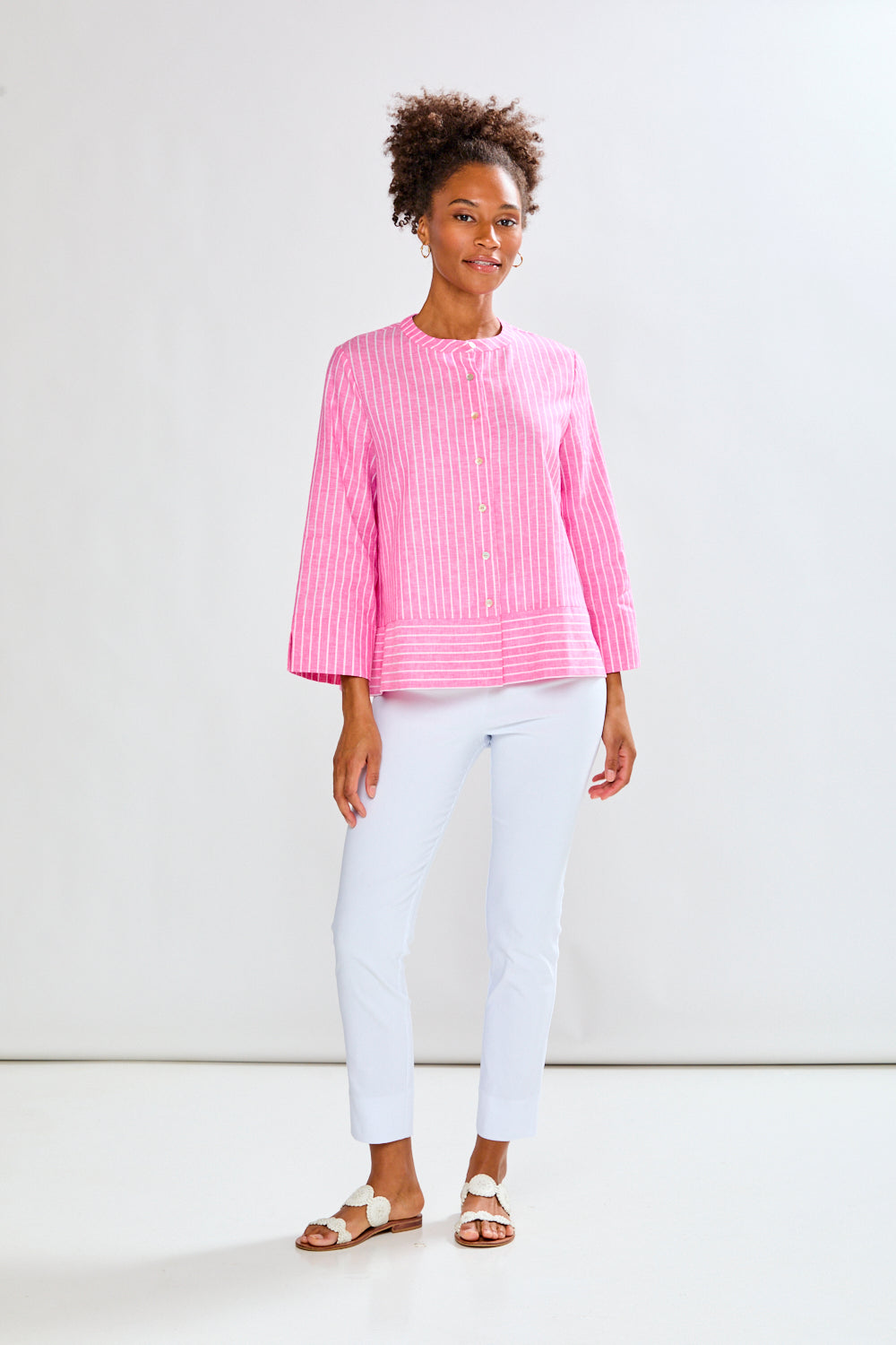 Woman in pink striped tunic