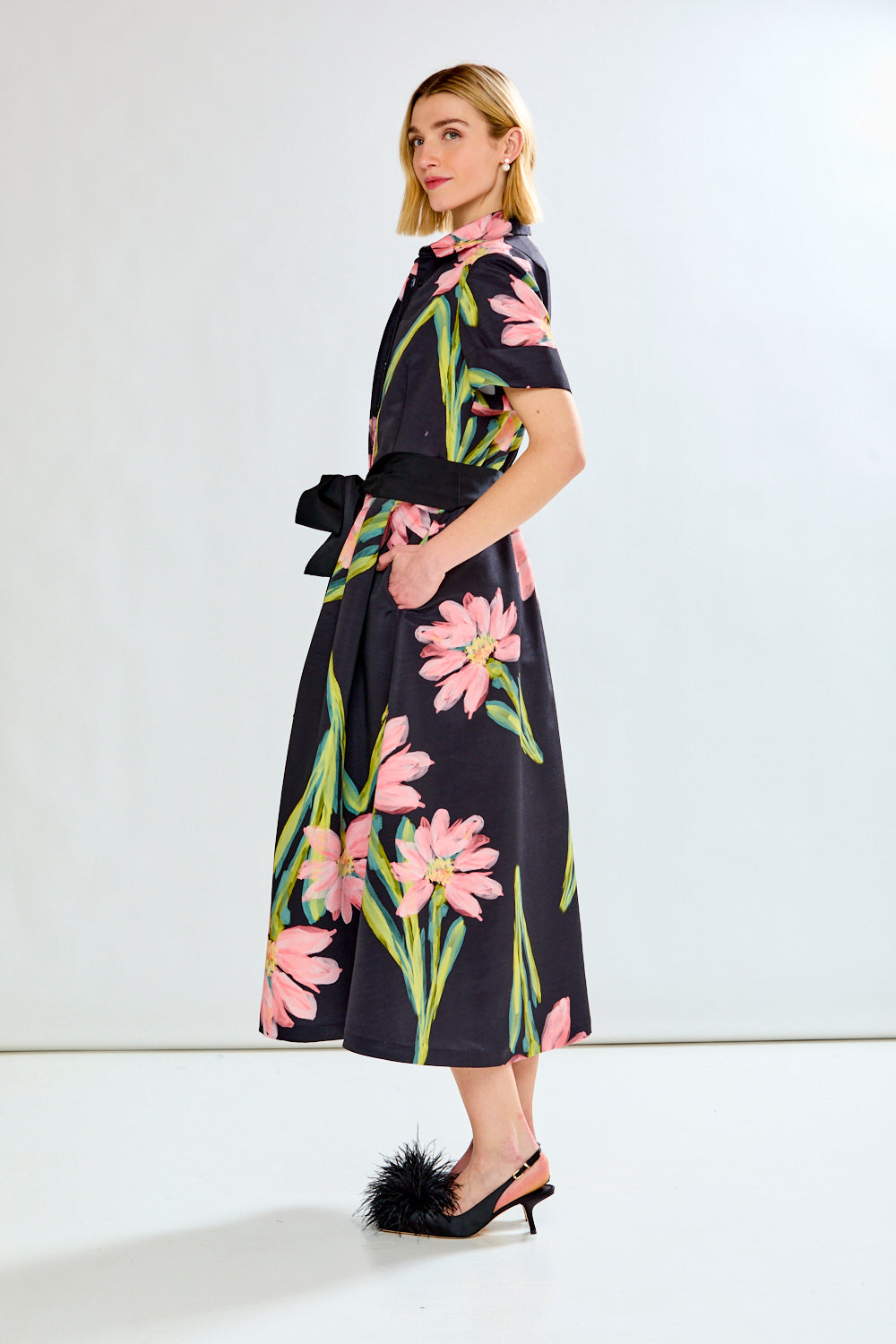 Woman wearing MARISOL DRESS IN FLORAL COSMOS - FLORAL COSMOS