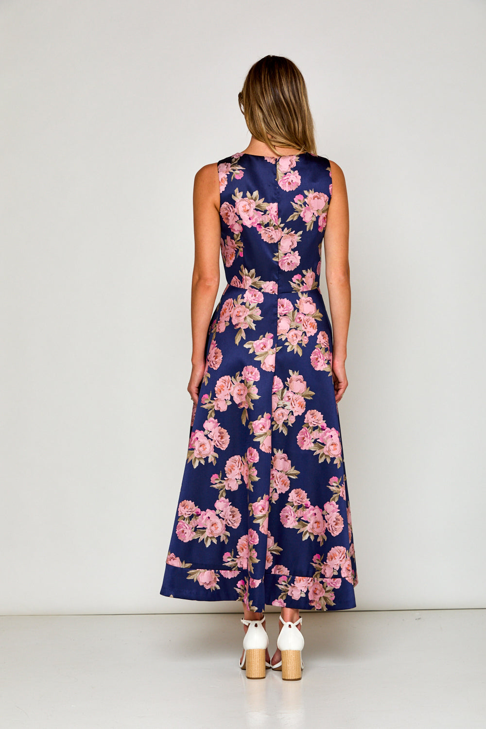 Woman in navy floral dress