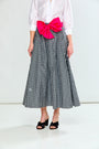 Woman wearing The Deanna Skirt in Check in Black Check