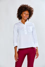 Woman wearing a white shirt and pink pants on a white background